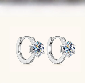 Detailed close-up of S925 sterling silver hoop earrings with 1ct moissanite 6-prong setting