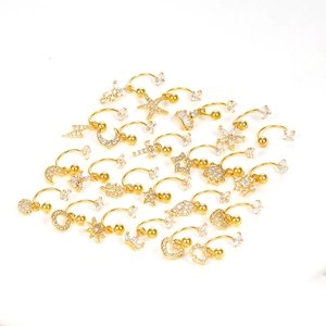 Gold C-shaped stainless steel ear cuff set with flower and star zircon pendants