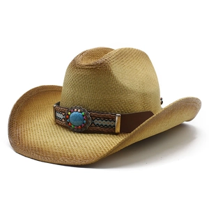 Classic straw cowboy hat with ethnic turquoise band and rolled brim on white background