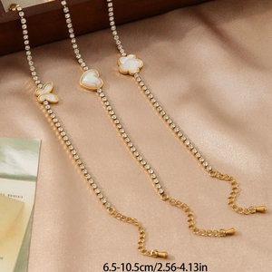 French gold titanium steel bracelet set with butterfly, heart, and flower charms