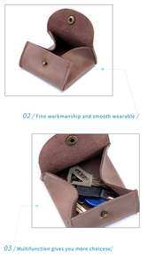 Detail of brown leather coin pouch with metal snap button showing interior storage space