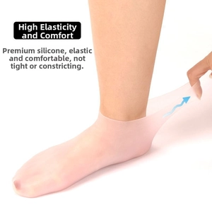 Close-up of pink translucent silicone foot cover showing high elasticity and soft texture