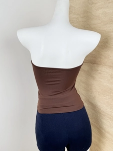 Rear view of brown strapless tube top on mannequin showing fabric texture and fit