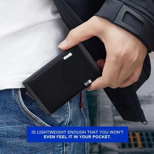 Slim RFID wallet shown slipping easily into a denim jeans pocket for portability