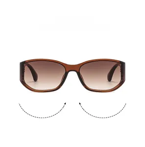 Detail view of bold temples and brown gradient lenses on trendy wrap-around sunglasses