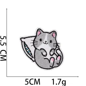 Detail showing cartoon grey cat embroidery patch with dimensions 5.5cm by 5cm