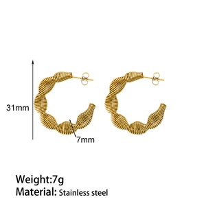 Detail view of gold stainless steel spiral earrings showing dimensions and product weight