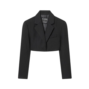 Women's black cropped blazer and trousers set with notch lapel on white background