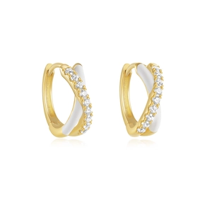 Macro shot of gold-plated silver hoop earrings with white enamel and sparkling zircons