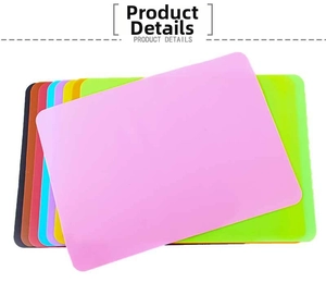 Detailed close-up of multiple colorful silicone placemats with safe rounded corners