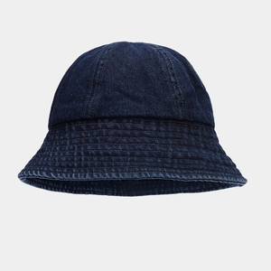 Close-up of deep blue denim bucket hat with reinforced parallel stitching on the brim