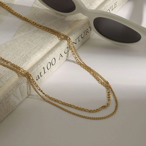 Double layered gold Figaro chain necklace made of durable polished stainless steel