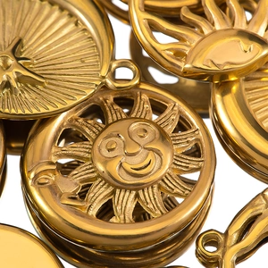 Retro stainless steel sun pendant with a smiling face and hollow design in golden finish