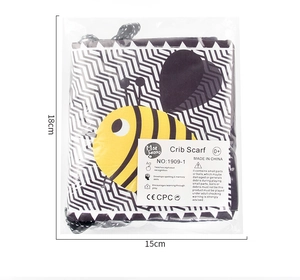 Detailed view of 15x18cm high-contrast black and white baby crib book with bee design