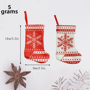 Mini Christmas stocking cutlery holder set with snowflake patterns for festive decor