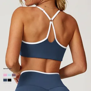Damen Sport-Set aus blauem BH und Leggings mit weißen Paspeln für Yoga und Fitness