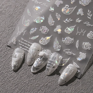 Laser holographic nail stickers featuring elegant swan and rose patterns for DIY manicure