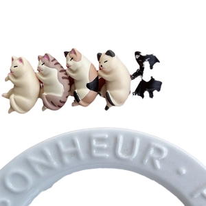 Cute cartoon cat hair clips with 3D sleeping kitty design on white display