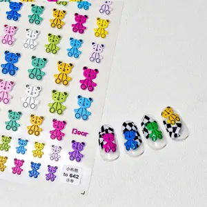 Cute 3D embossed teddy bear nail art stickers with colorful patchwork designs and patterns