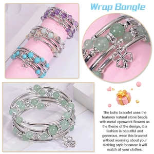 Detail of bohemian wrap bracelet with natural stone beads and metal flower charms