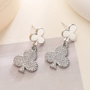 Elegant silver clover drop earrings with micro-pave zircons for a luxury look