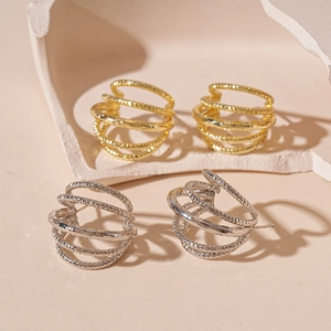 Minimalist multi-layered C-shaped geometric hoop earrings with textured gold and silver finish