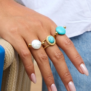 18K gold stainless steel ring set with turquoise and white pearl on model