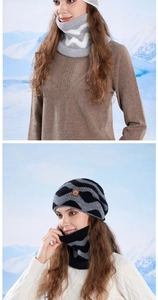 Detail of winter knitted hat and neck warmer set with wavy pattern and leather logo patch