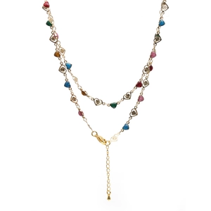 Double-layered golden necklace with colorful heart charms and lobster clasp closure