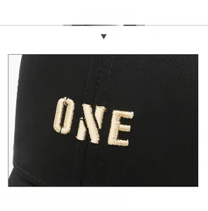 Macro detail of high-quality 3D ONE embroidery on black cotton twill baseball cap