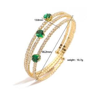 Three-layer gold-plated irregular bracelet with green gemstones and clear crystals