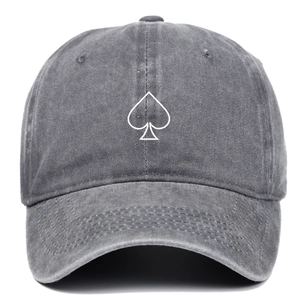 Washed dark grey baseball cap with embroidered spade heart design on a white background