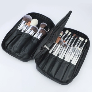 Detail view of the multi-slot interior organization of a professional makeup brush case