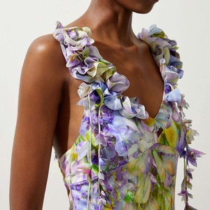 Floral print one-piece swimsuit featuring detailed 3D shoulder appliques and V-neckline