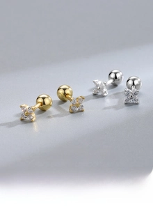 Macro detail of S925 sterling silver four-leaf clover stud earring with screw back