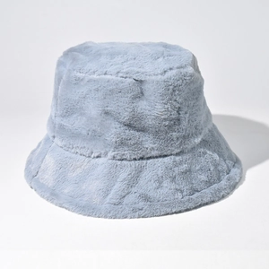 Detailed view of the soft light blue-grey plush texture on a warm winter bucket hat
