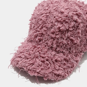 Chic pink fuzzy faux fur baseball cap for women with thick warm plush texture and minimalist style