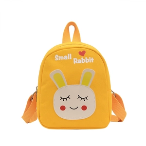 Yellow canvas kids backpack with cute rabbit and Small Rabbit text on white background