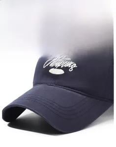 Detail of navy cotton baseball cap showing white Champions 1989 embroidery and stitching