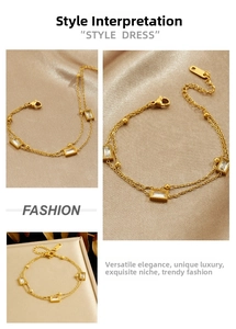 Detail of double-layer gold plated stainless steel bracelet with zircon and beads