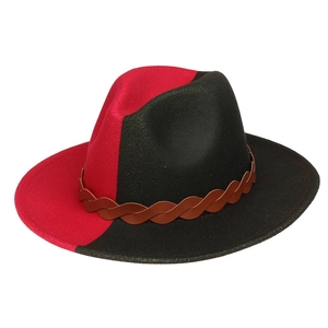 Detail of red and black split-color wool fedora hat with brown braided leather band