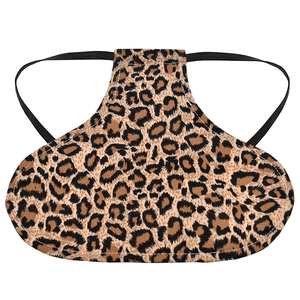 Detailed view of leopard print chicken saddle with durable canvas and elastic straps