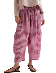 Detailed view of purple striped pleated pants with drawstring waist and large side pockets