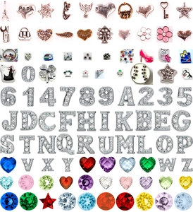 Macro view of assorted DIY floating charms with alphabet letters and colorful crystals