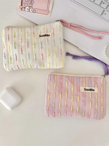Portable textured cosmetic bag set with rainbow stripe pattern and braided wrist strap