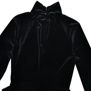 Detail of black velvet slim fit dress featuring high neck and button closure on back
