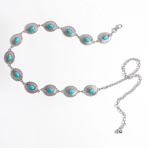Vintage silver metal waist chain featuring oval turquoise stones in a boho style