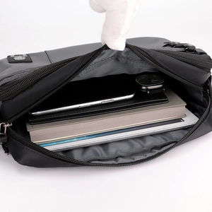 Waterproof nylon crossbody bag for men showing large capacity with tablet and books