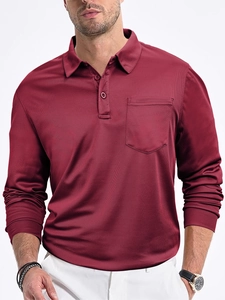 Detail view of burgundy knitted mesh fabric and chest pocket on a long sleeve polo shirt