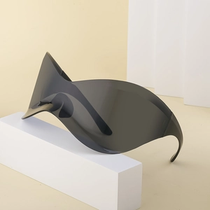 Futuristic oversized rimless wrap sunglasses in translucent grey for Y2K outdoor style